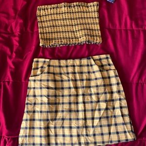 Two piece CLUELESS outfit. Tube top, mini skirt. Yellow and black.
